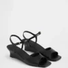 Veganistische sandalen met sleehak