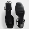 Veganistische sandalen met sleehak