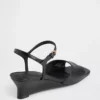 Veganistische sandalen met sleehak
