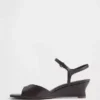 Veganistische sandalen met sleehak