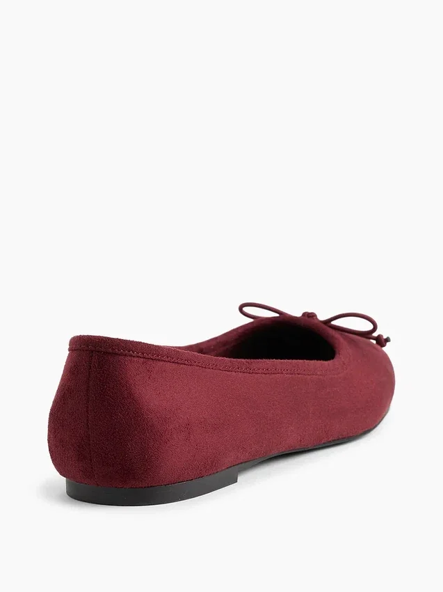 Veganistische suède ballerina’s