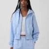 Vintagesoft hoodie met rits en schuine pas
