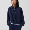 Vintagesoft oversized pullover met halve rits en wigvormige hals