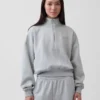 Vintagesoft oversized pullover met halve rits en wigvormige hals