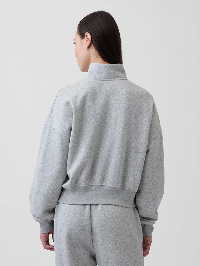 Vintagesoft oversized pullover met halve rits en wigvormige hals