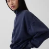 Vintagesoft oversized pullover met halve rits en wigvormige hals