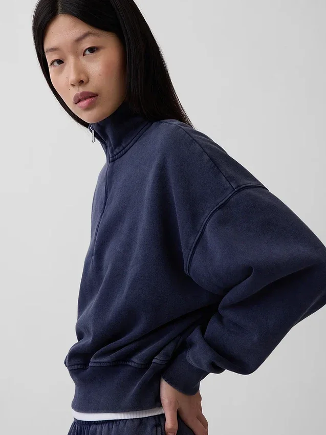 Vintagesoft oversized pullover met halve rits en wigvormige hals