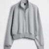 Vintagesoft oversized pullover met halve rits en wigvormige hals