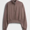 Vintagesoft oversized pullover met halve rits en wigvormige hals