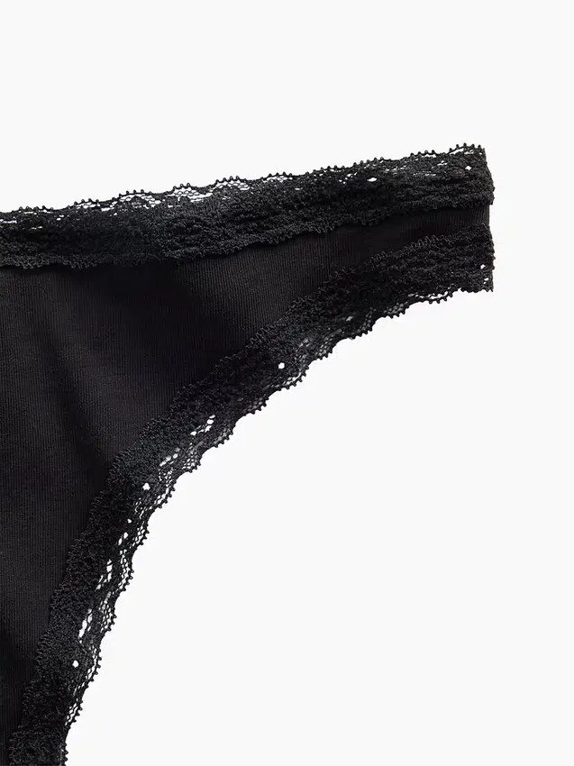 Zachtste biologische stretchkatoenen string met kanten rand