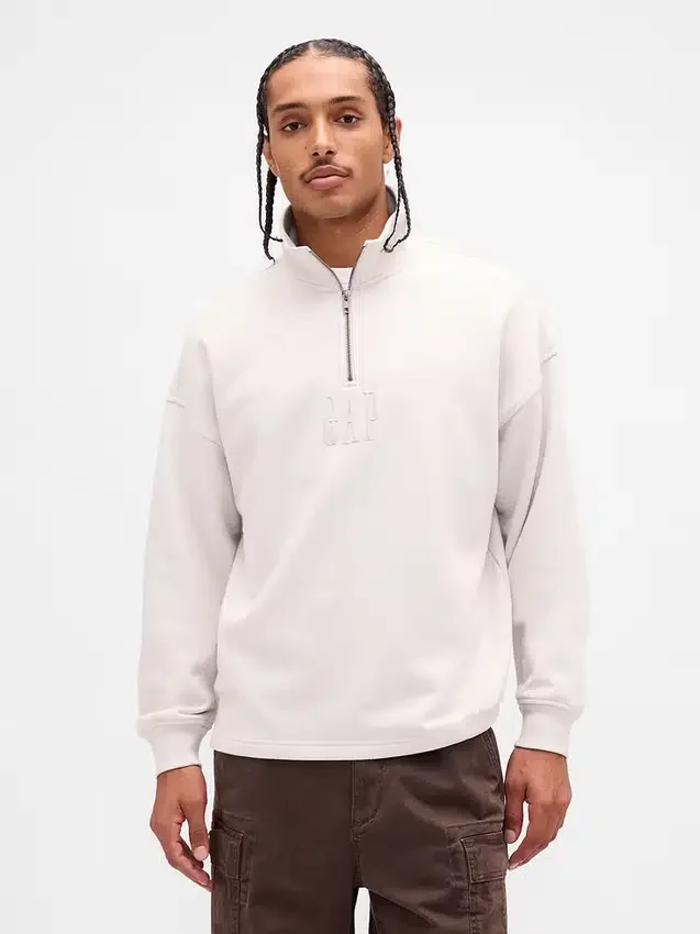 Zware oversized pullover met logo en kwartritssluiting